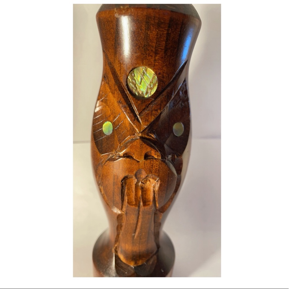 New Zealand hand carved Tiki with handle.